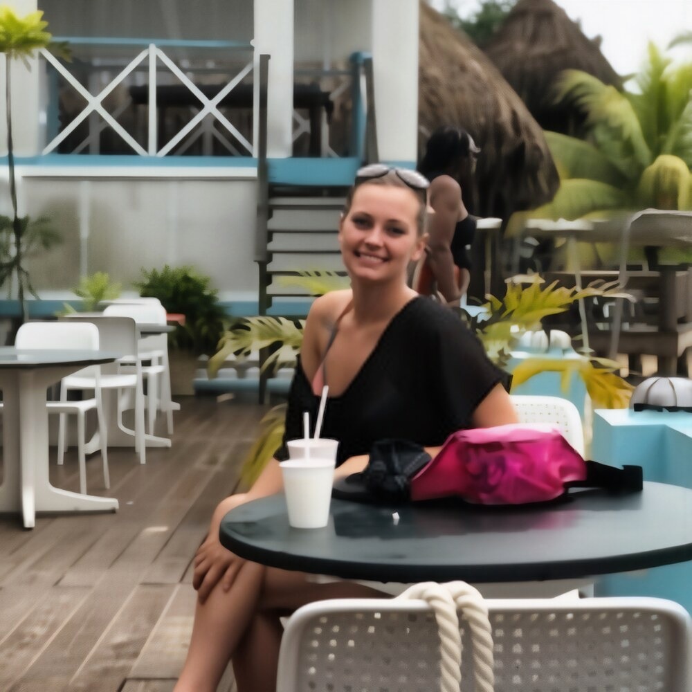A member of our team at a beachside cafe