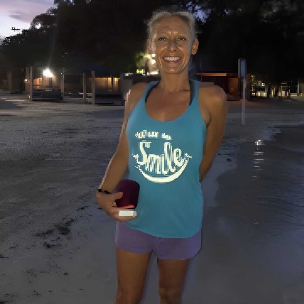 A member of our team in a Will to Smile shirt in Jamaica