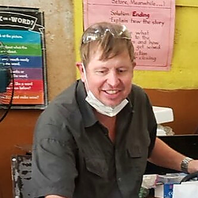 Dr. Will at the field clinic chair